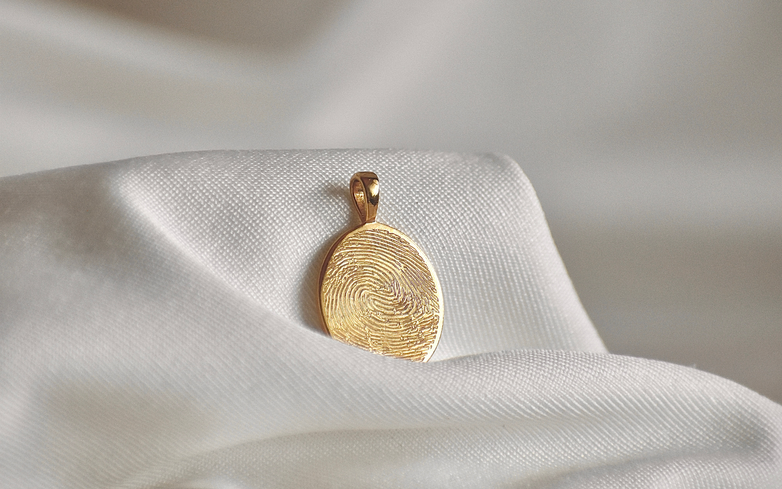 Fingerabdruckgravur, Gravurkette mit Fingerabdruck