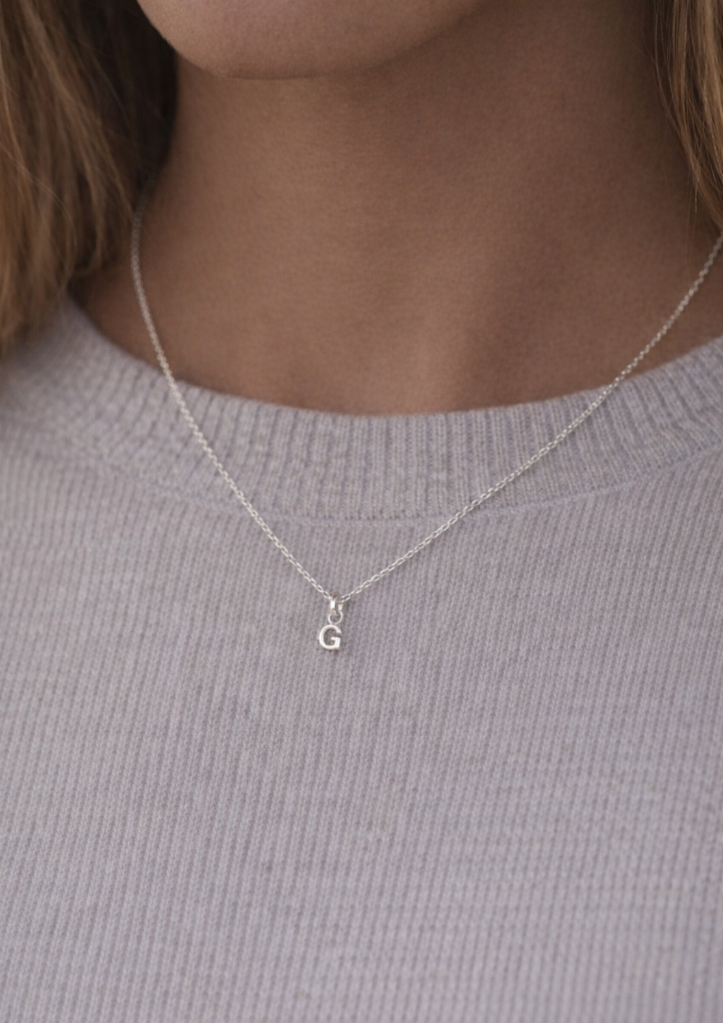 Kette mit Buchstabenanhänger